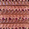 Close-up of rose petals bars with a wavy pattern and decorative elements.