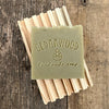 Balsam fir and mint handmade soap on wood soap dish