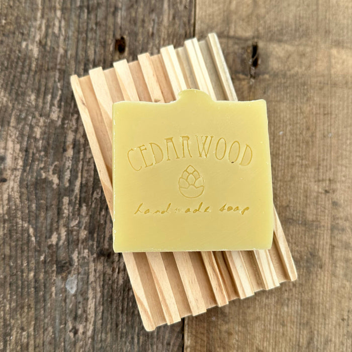 Bergamot bay handmade soap on wood soap dish