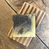 Bourbon Barrel handmade soap on wood soap dish 