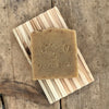 Cinnamon Oatmeal handmade soap bar on wood soap dish 