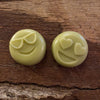 Two Happy Hemp smiley face emoji lotion bars