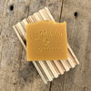 Lemongrass IPA handmade soap bar on wood soap dish 