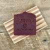 Handmade soap bar made with wine on wood soap dish